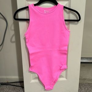 Neon pink body suit